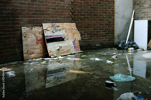 trash in flooded alley