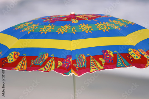 Obraz na płótnie colorful closeup beach umbrella w salonie