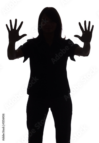 silhouette of woman showing stop