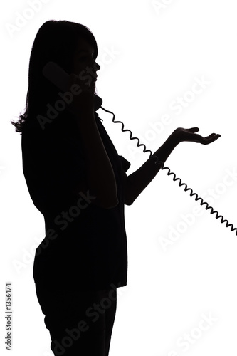silhouette of woman on the phone