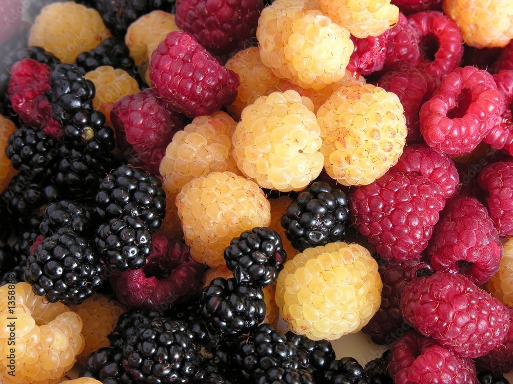 red,yellow and black strawberries red,yellow and black strawberries