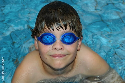 boy swimming with goggles without clear vision