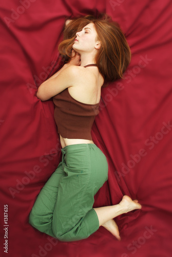 woman lying on bed