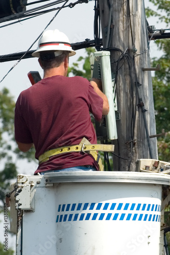 lineman talking on a touchtone