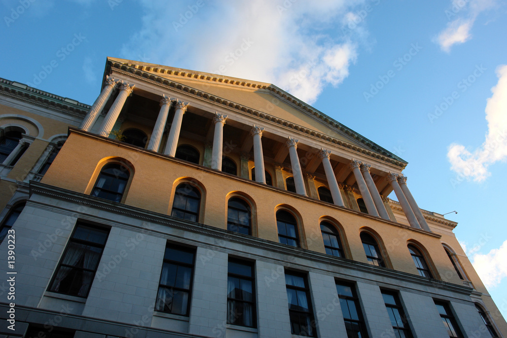 unusual view of the massachusetts state house at sunset