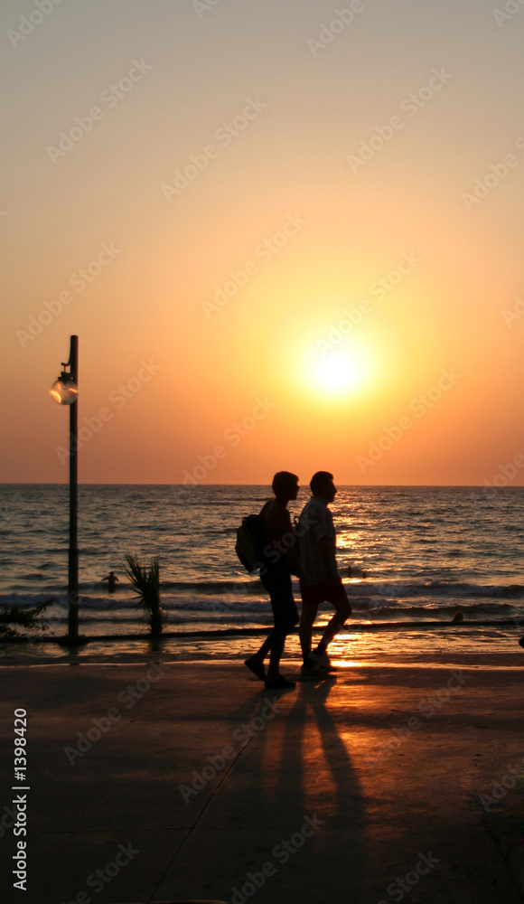 sunset couple on the beach
