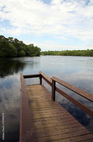 pier at the summer time lake