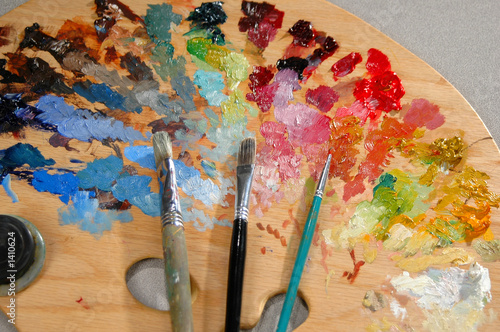 artist's palette with brushes