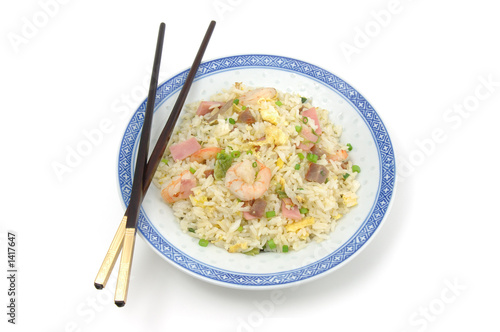 plate of fried rice and chopsticks
