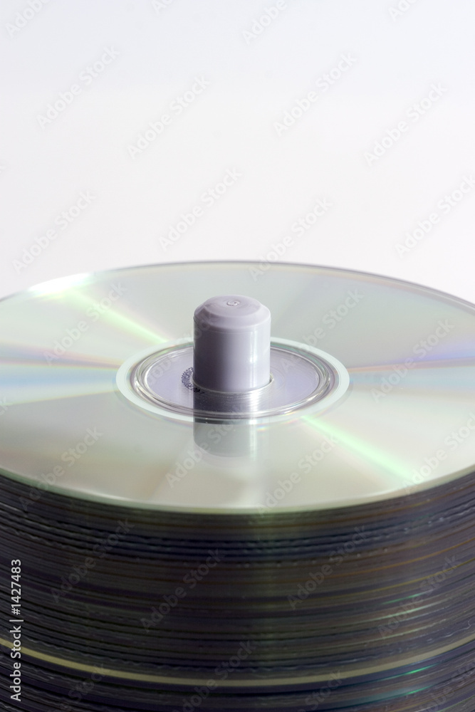 close-up of cd stack on white background close-up of cd stack on white background