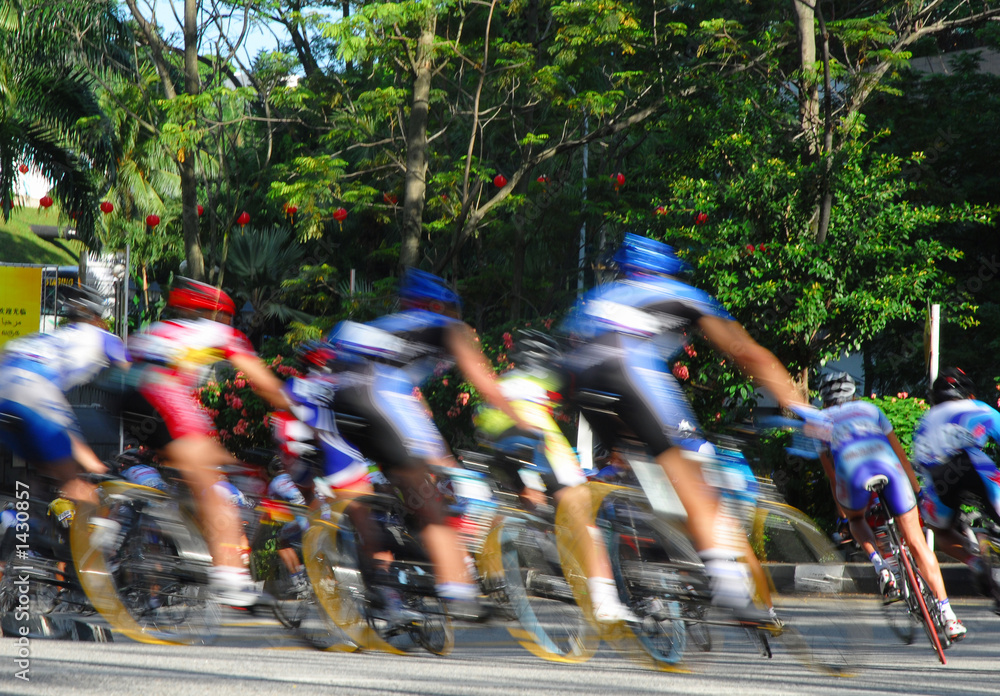 Obraz premium stock photo of bicycle racing in motion blur