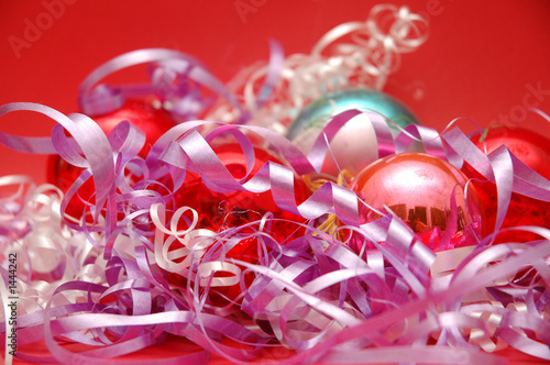 various christmas decorations on red background