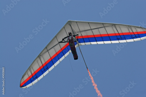hanglider close up with smoke trail