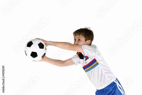 child playing soccer © Leah-Anne Thompson
