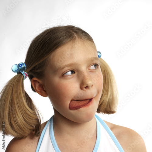 girl cleaning her lips with her tongue