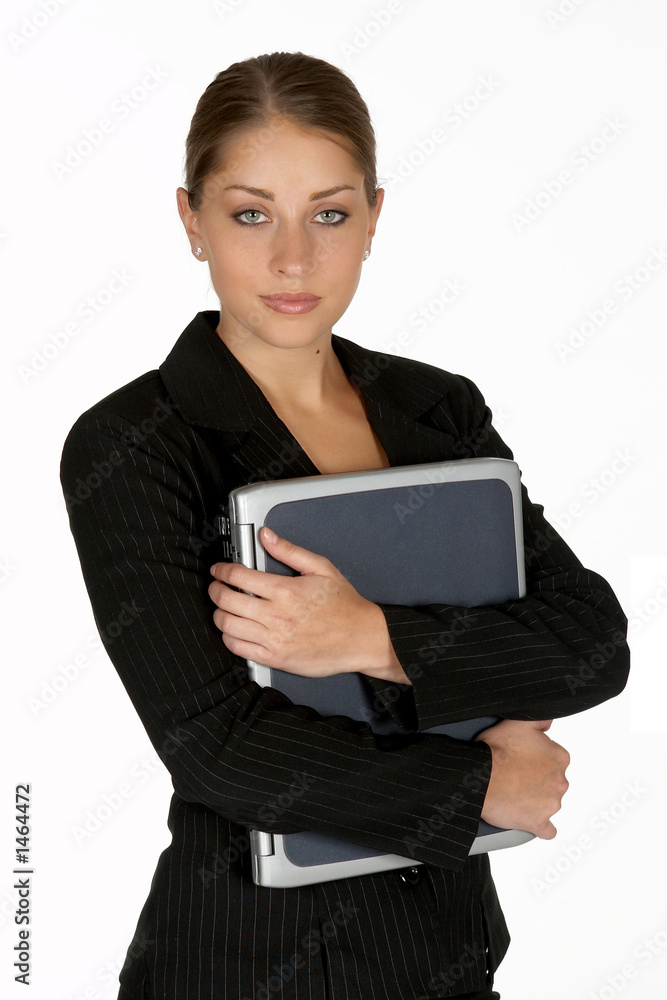 business woman with arms folder around laptop business woman with arms folder around laptop
