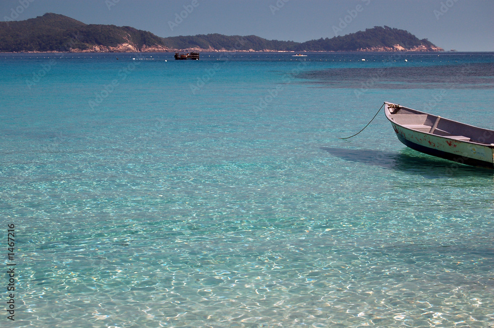 Fototapeta premium boat on the blue sea