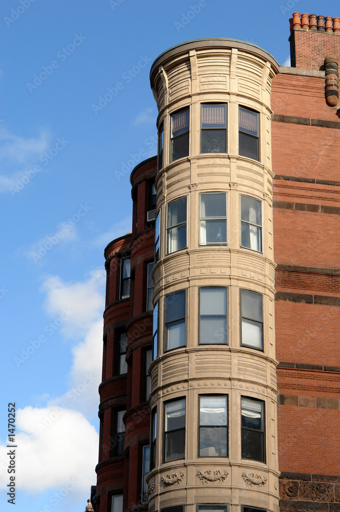 ornate rounded bay windows two