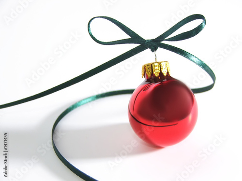red ornament with green ribbon