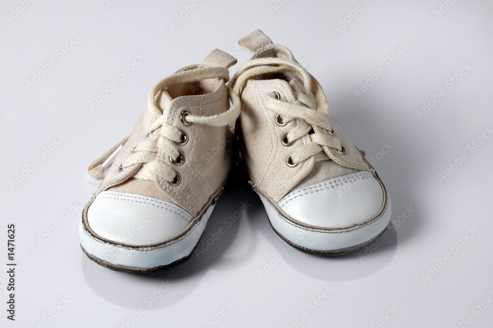baby sneakers over white background baby sneakers over white background