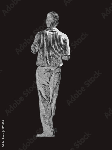 young man walking into darkness