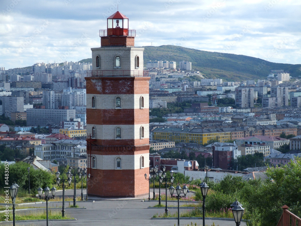lighthouse and murmansk city panorama