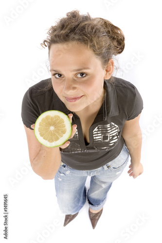 young woman with half of a grejpfrut