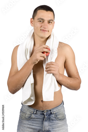 undressed man with towel and apple