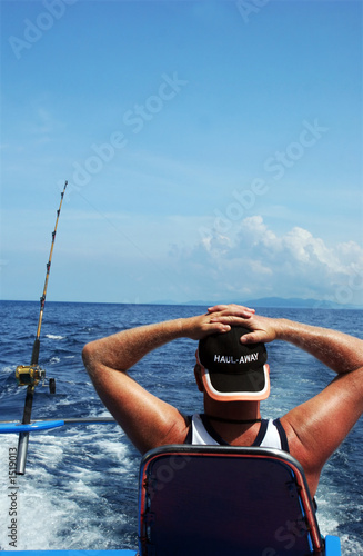 man deep sea fishing