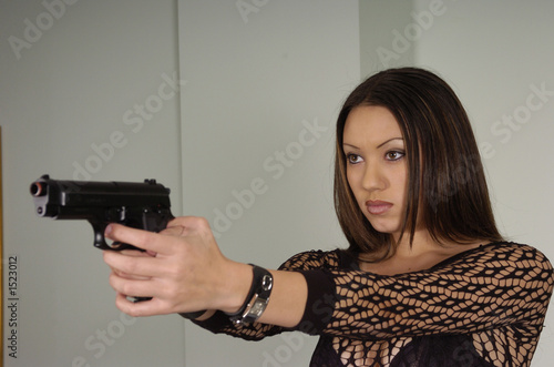 sexy asian girl with gun