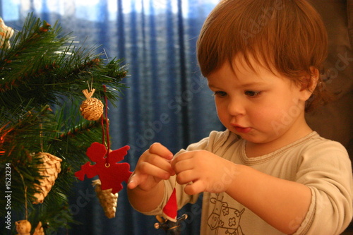 child and christmas tree