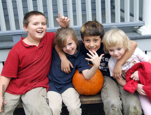 four kids playing together