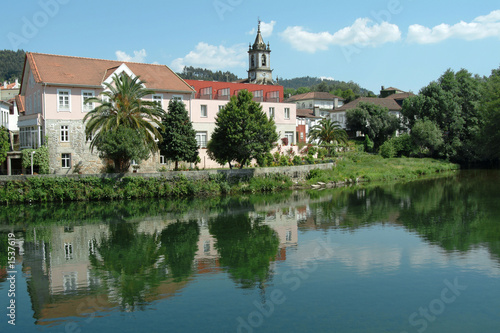 houses and church in the edge of the river