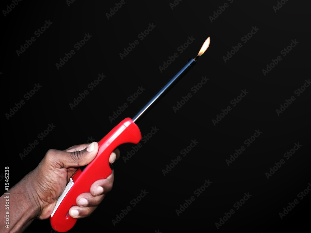 hand holding a lighter isolated by a clipping path