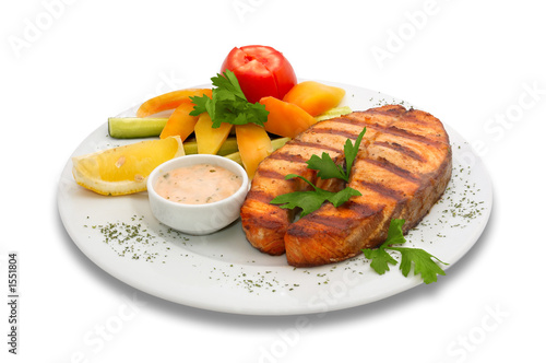 grilled sturgeon fish with vegetables photo