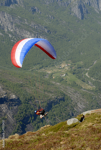 paragliding over mountains