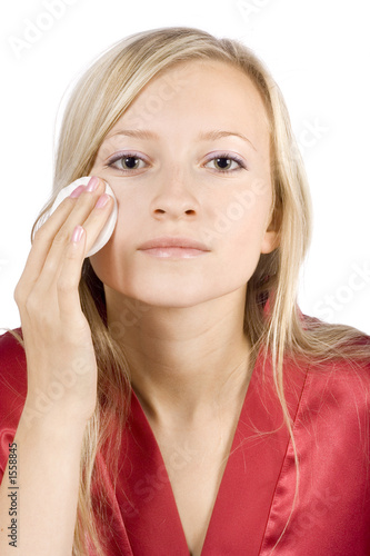 young woman dressed red bathrobe removal make-up