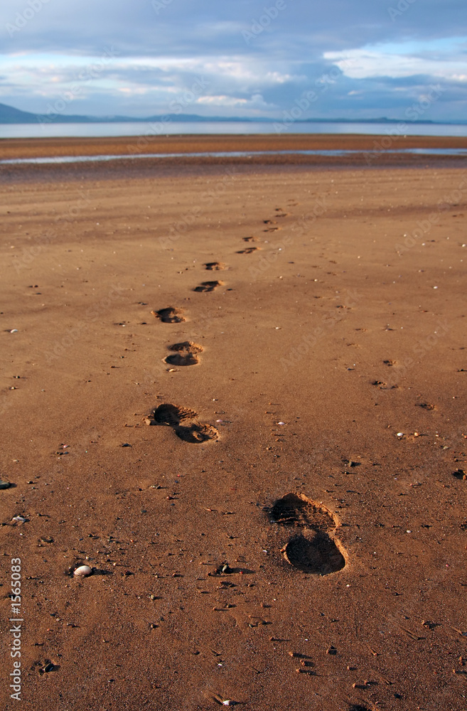 footprints on beach footprints on beach