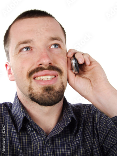 happy male talking to mobile phone
