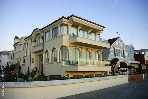 luxury home with arched windows