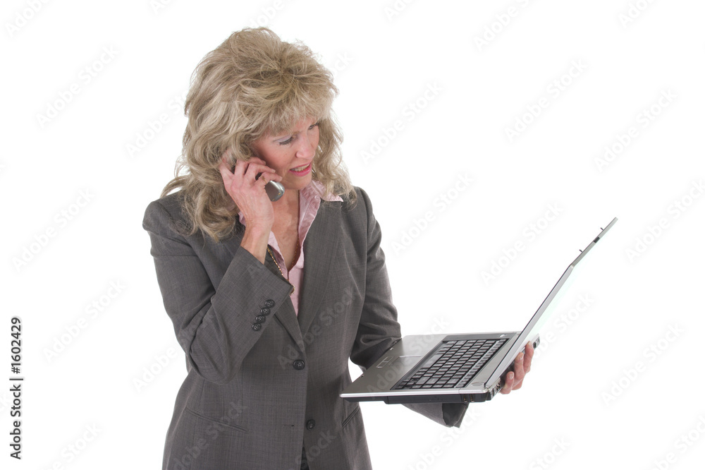 business woman multitasking with cellphone and laptop 3 business woman multitasking with cellphone and laptop 3