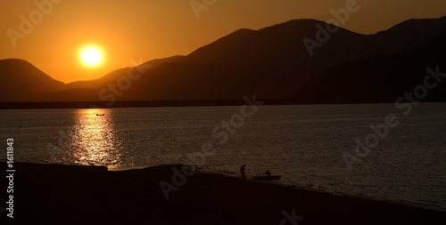sunset and fishermen