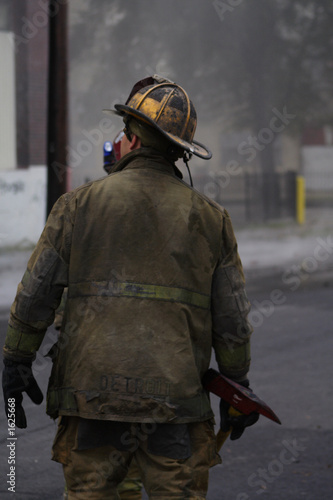 fireman with a mask on at a fire