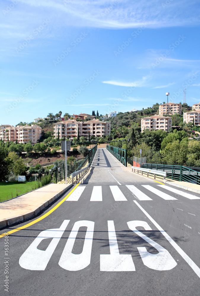 new road and bridge over golf course in spain