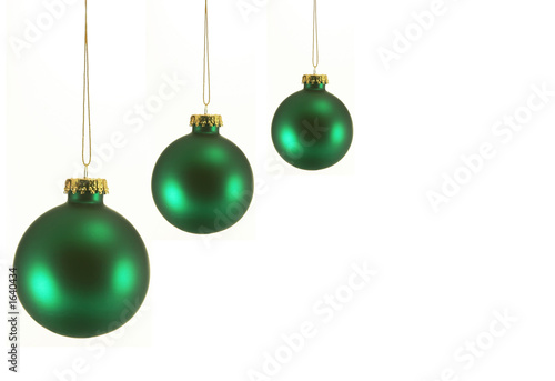 three green christmas ornaments
