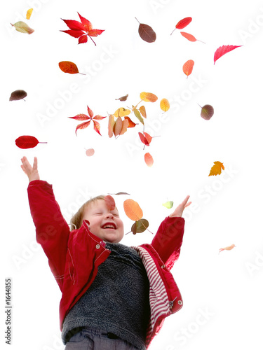 boy and autumn leaves