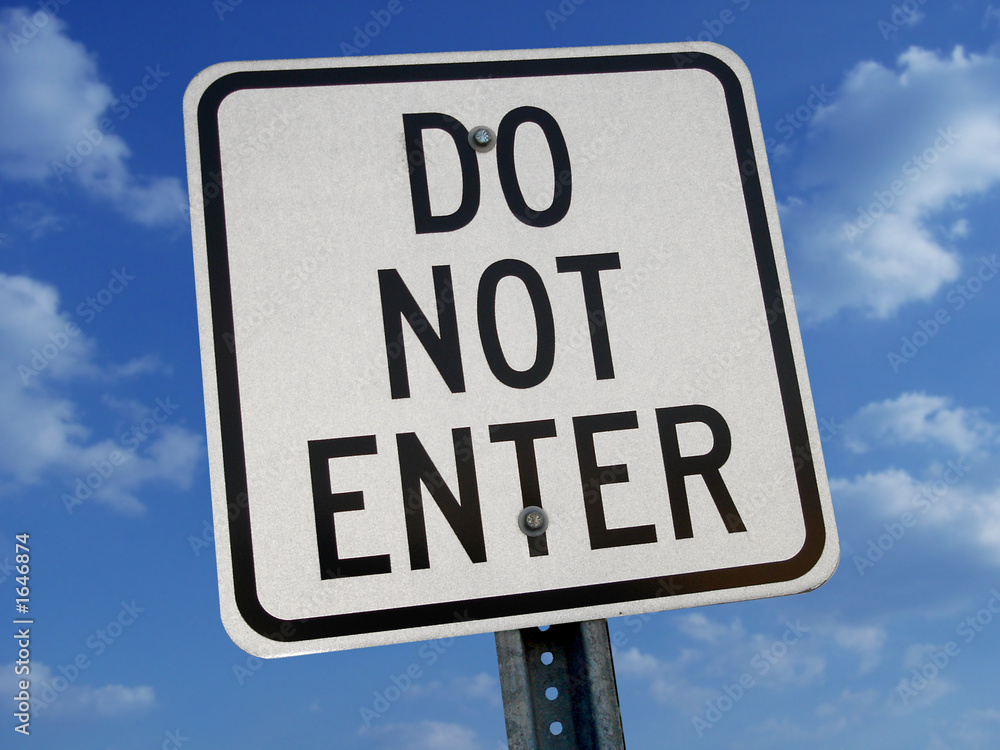 do not enter sign against blue sky do not enter sign against blue sky