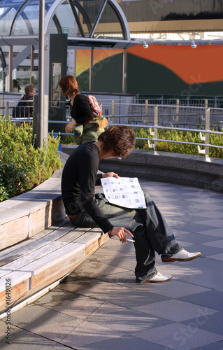 man reading a magazine