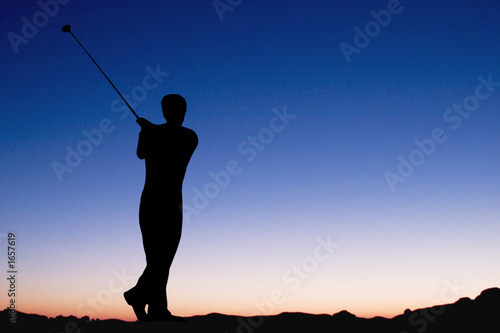 playing golf at dawn