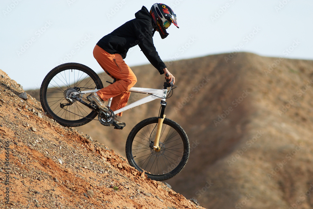Naklejka premium girl downhill on bike
